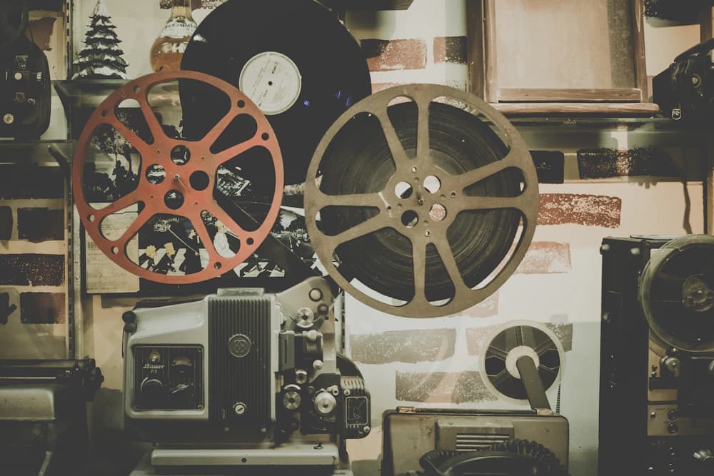 Vintage film reels and projection equipment